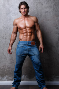 Handsome muscle man in jeans